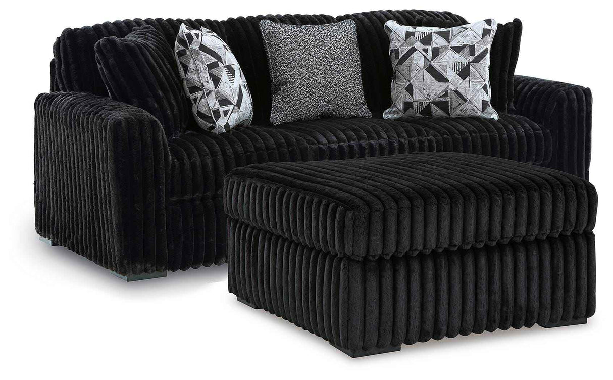 Midnight-Madness Onyx Sofa and Oversized Ottoman by Ashley at Eve Furniture