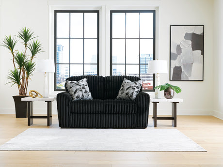 Midnight-Madness Onyx Sofa, Loveseat and Oversized Ottoman by Ashley at Eve Furniture