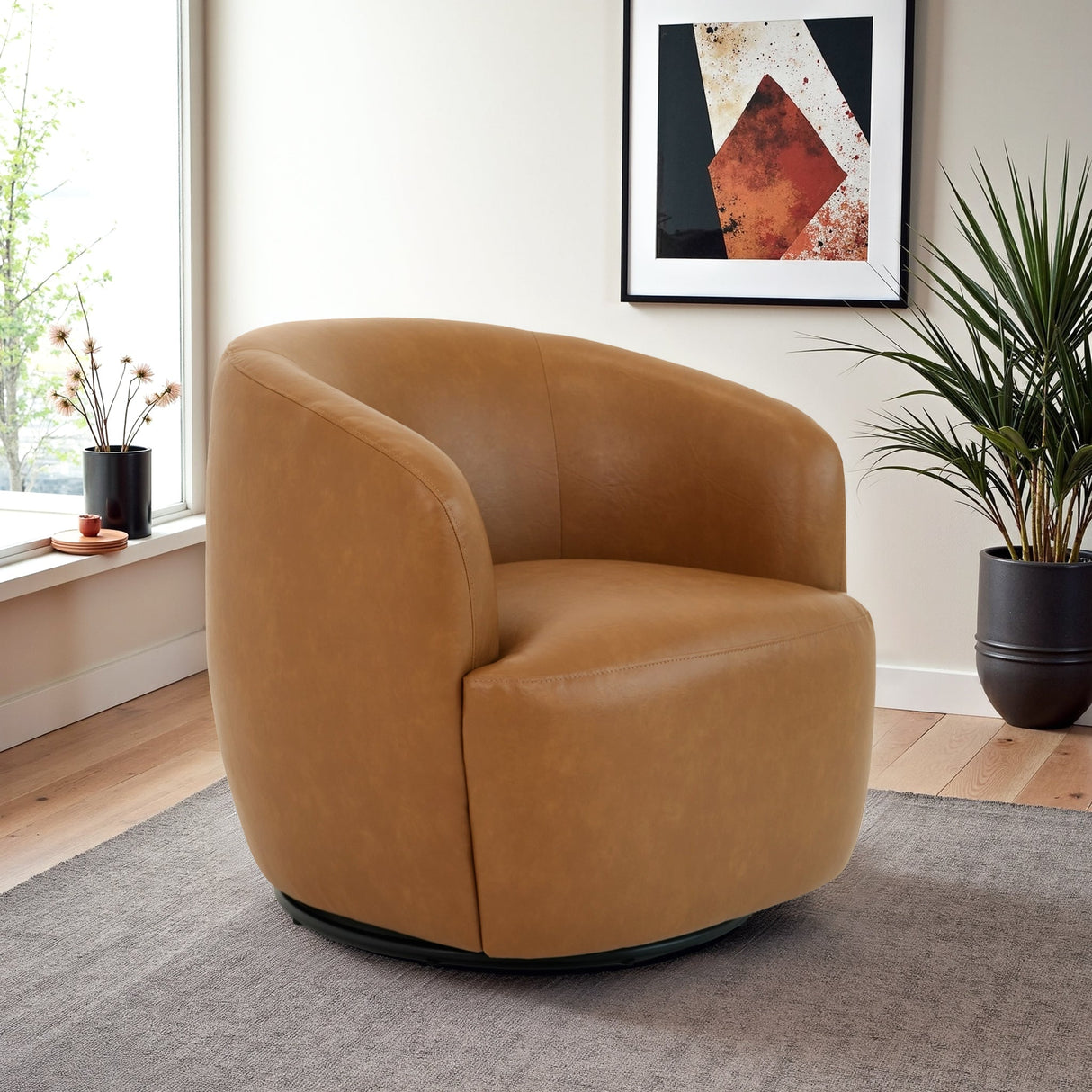 Mina 32" W Tan Vegan Leather Upholstered Swivel Barrel Chair by Ashcroft Imports at Eve Furniture