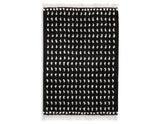 Minston Black/White 5' x 7' Rug by Ashley at Eve Furniture