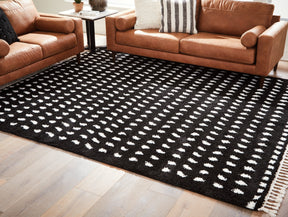 Minston Black/White 5' x 7' Rug by Ashley at Eve Furniture