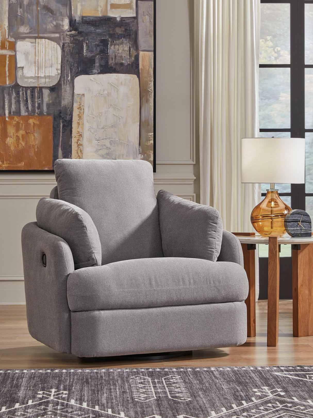 Modmax Granite Swivel Glider Chair by Ashley at Eve Furniture