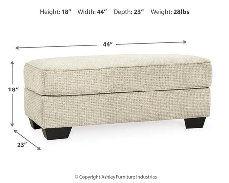 Monaghan Sandstone Ottoman by Ashley at Eve Furniture