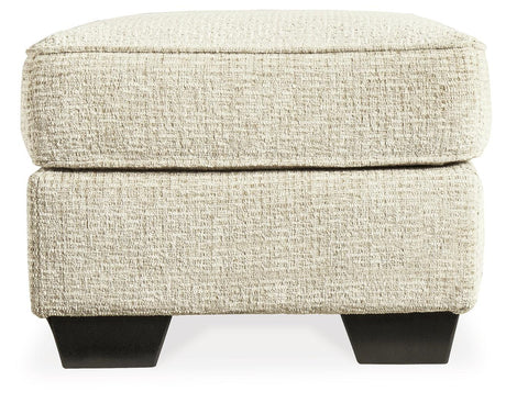 Monaghan Sandstone Ottoman by Ashley at Eve Furniture