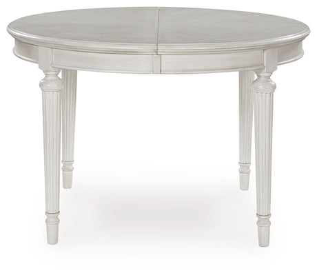 Montelaine Antiqued White Extendable Dining Room Set by Ashley at Eve Furniture