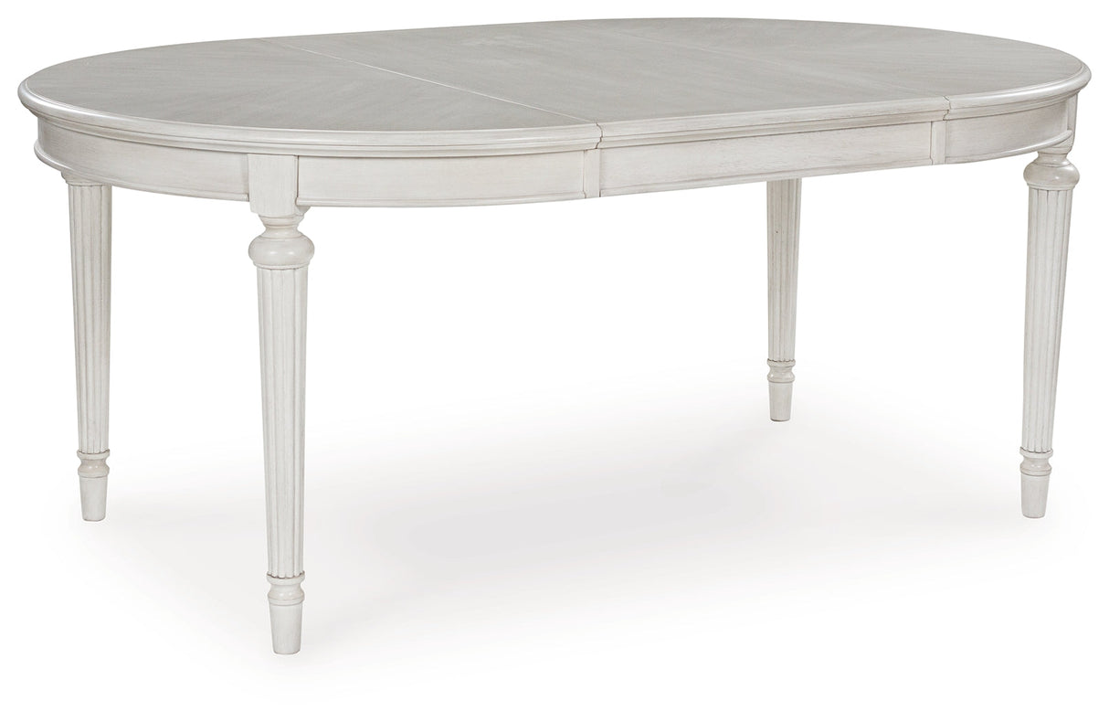 Montelaine Antiqued White Extendable Dining Room Set by Ashley at Eve Furniture