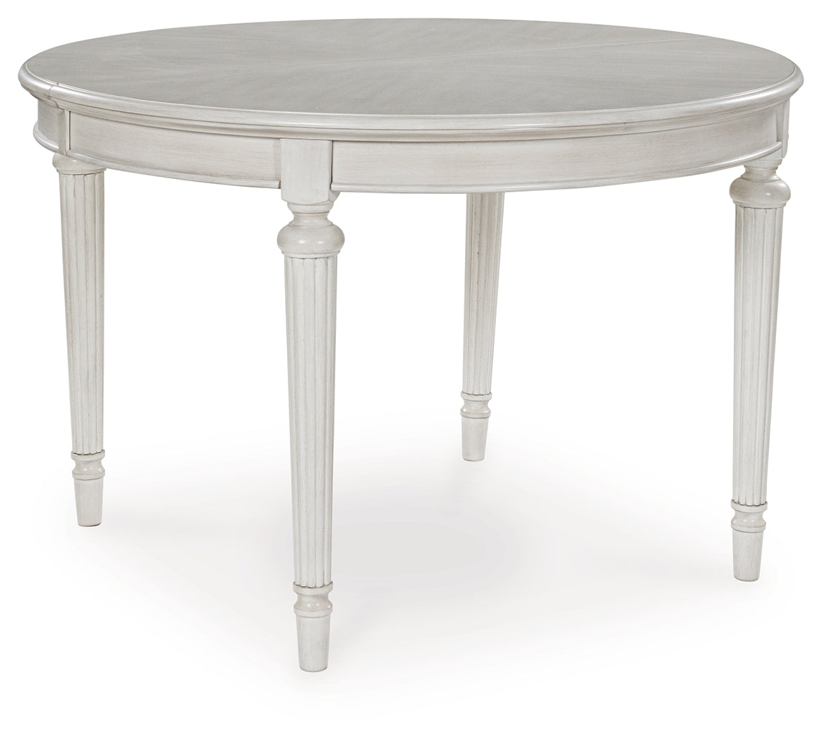 Montelaine Antiqued White Extendable Dining Room Set by Ashley at Eve Furniture