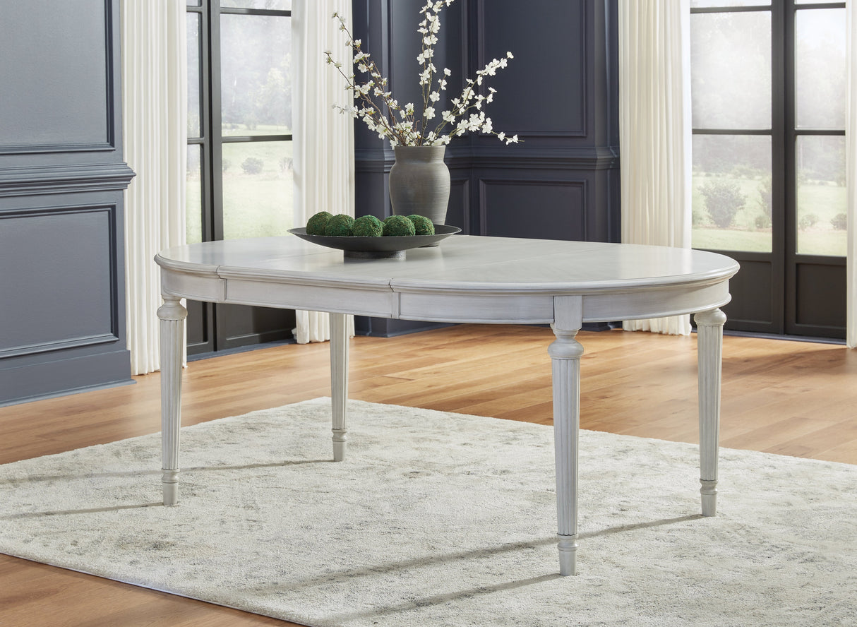 Montelaine Antiqued White Extendable Dining Room Set by Ashley at Eve Furniture