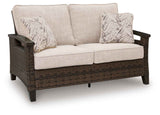 Monterey Point Dark Brown Outdoor Loveseat with Cushion by Ashley at Eve Furniture