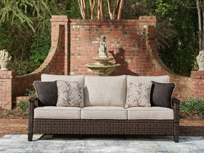 Monterey Point Dark Brown Outdoor Sofa with Cushion by Ashley at Eve Furniture