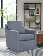 Nenana Next-Gen Nuvella Denim Swivel Glider Accent Chair by Ashley at Eve Furniture