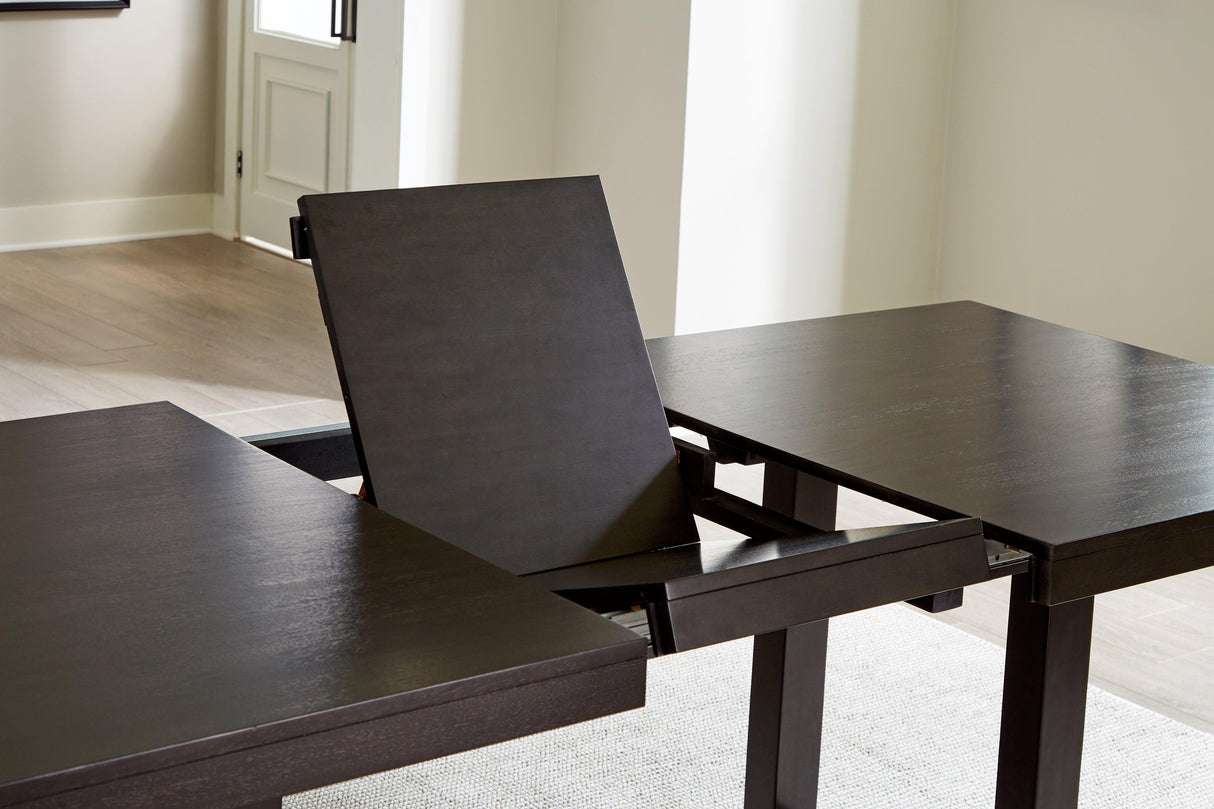 Neymorton Dark Grayish Brown Dining Extension Table by Ashley at Eve Furniture