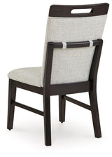 Neymorton Dark Grayish Brown Dining Table and 8 Chairs by Ashley at Eve Furniture
