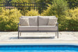 Ocean Beach Gray Outdoor Loveseat with Cushion by Ashley at Eve Furniture