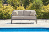 Ocean Beach Gray Outdoor Loveseat with Cushion by Ashley at Eve Furniture