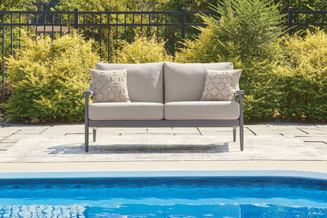 Ocean Beach Gray Outdoor Sofa and Loveseat by Ashley at Eve Furniture