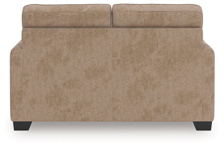 Olten Mocha Loveseat by Ashley at Eve Furniture