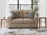 Olten Mocha Loveseat by Ashley at Eve Furniture