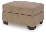 Olten Mocha Ottoman by Ashley at Eve Furniture
