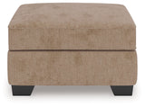Olten Mocha Ottoman by Ashley at Eve Furniture