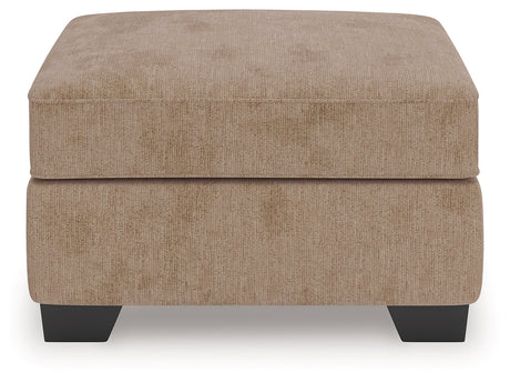 Olten Mocha Ottoman by Ashley at Eve Furniture