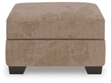 Olten Mocha Ottoman by Ashley at Eve Furniture