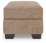 Olten Mocha Ottoman by Ashley at Eve Furniture