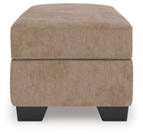 Olten Mocha Ottoman by Ashley at Eve Furniture