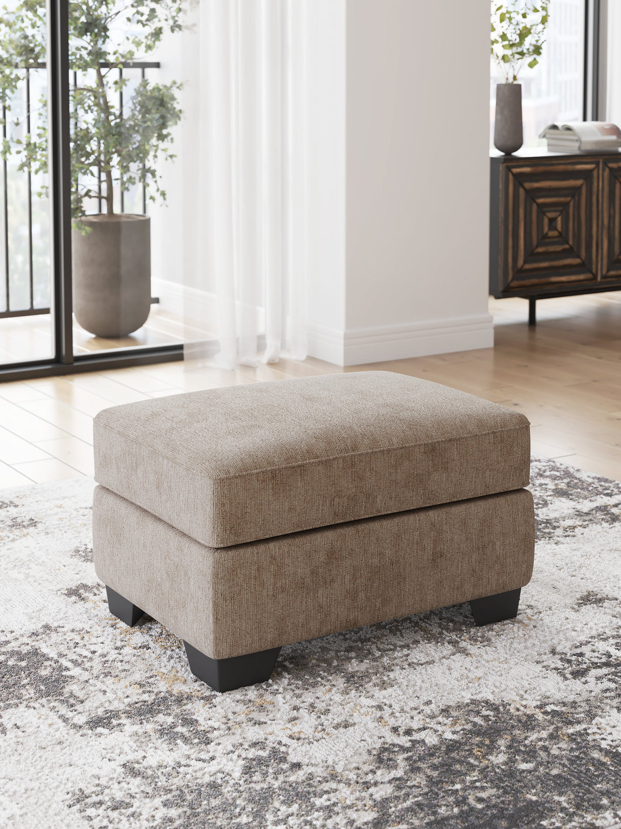 Olten Mocha Ottoman by Ashley at Eve Furniture