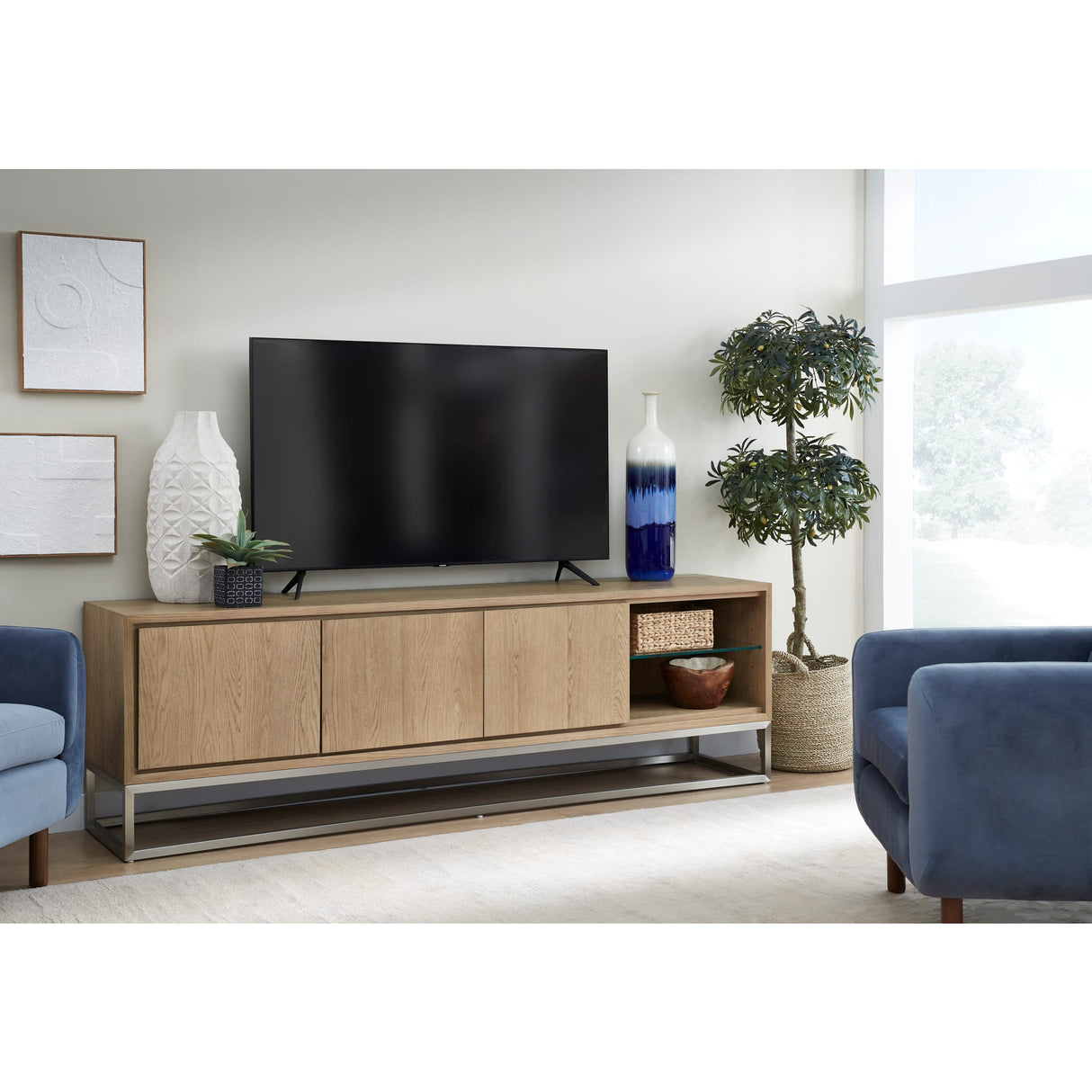 One Coastal Modern 84 inch TV Console in Brushed Stainless Steel and Bisque by Modus Furniture at Eve Furniture