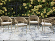 Orchard Beach Beige Outdoor Arm Chair with Cushion (Set of 4) by Ashley at Eve Furniture