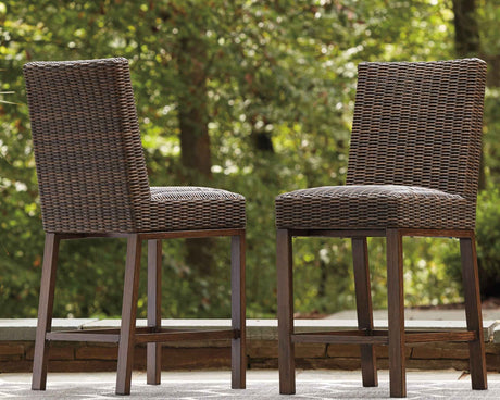Paradise Trail Medium Brown Bar Stool (Set of 2) by Ashley at Eve Furniture