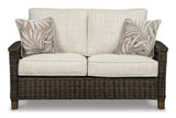Paradise Trail Medium Brown Loveseat with Cushion by Ashley at Eve Furniture