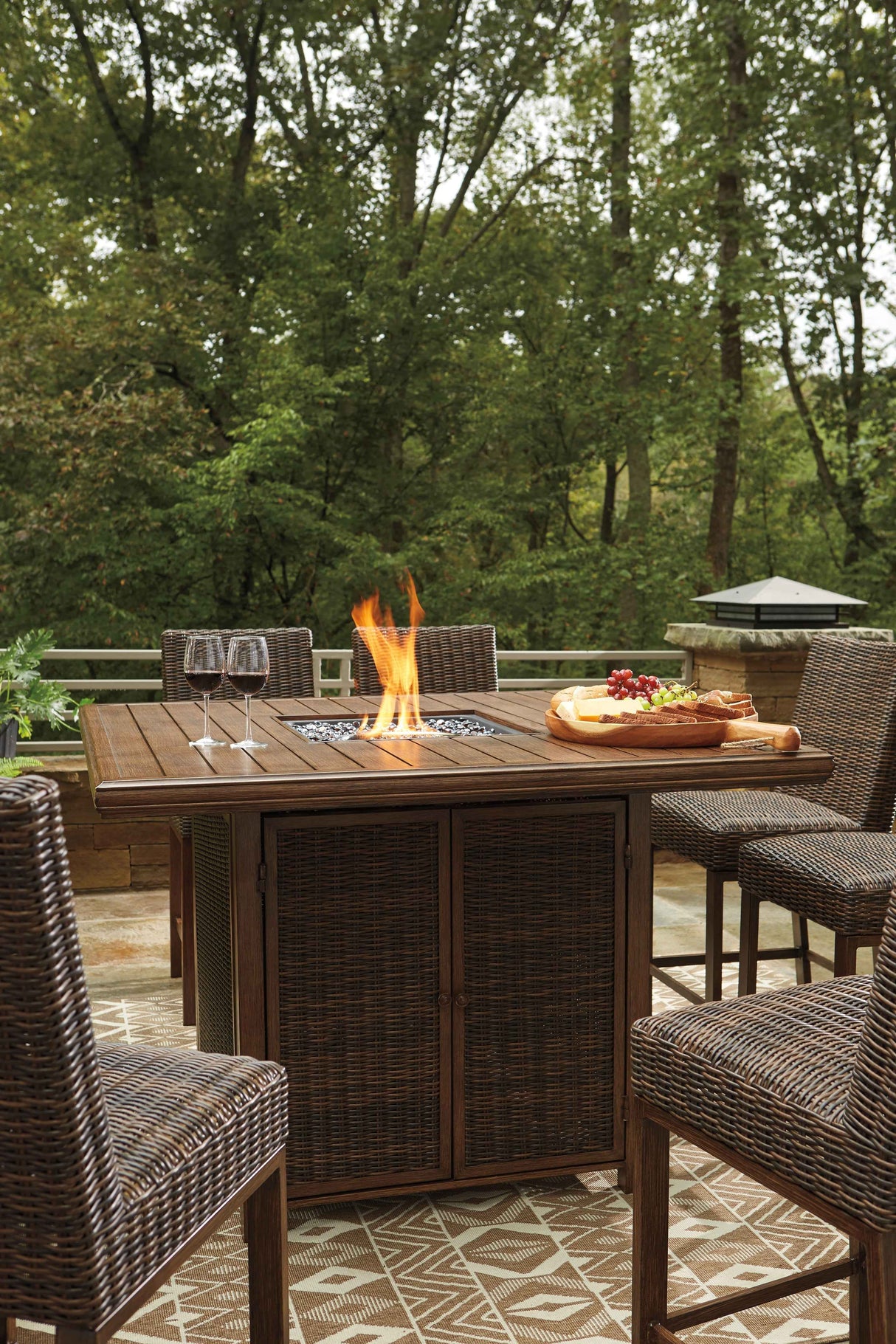 Paradise Trail Medium Brown Outdoor Bar Fire Pit Table with 6 Barstools by Ashley at Eve Furniture