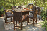 Paradise Trail Medium Brown Outdoor Counter Height Dining Table with 6 Barstools by Ashley at Eve Furniture