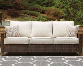 Paradise Trail Medium Brown Sofa with Cushion by Ashley at Eve Furniture