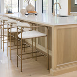 Parker Cream Fabric Seat Gold Metal Counter Stool by Mercana at Eve Furniture
