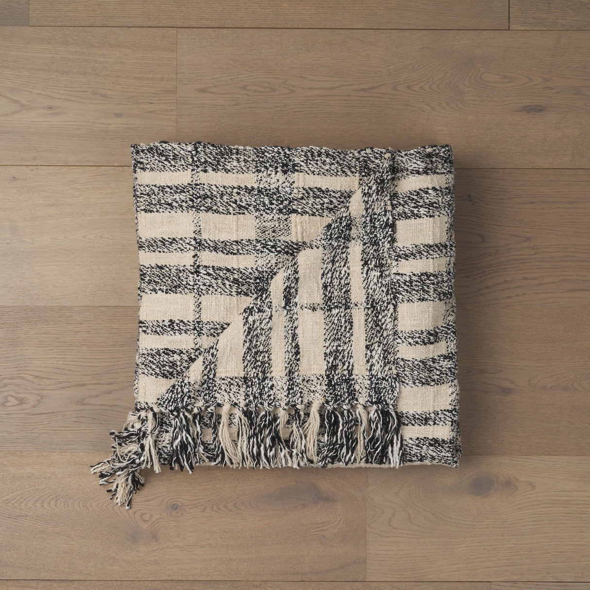Pendle Cream w/ Woven Black Plaid Pattern Cotton Throw Blanket by Mercana at Eve Furniture