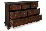 Porter Rustic Brown Dresser by Ashley at Eve Furniture