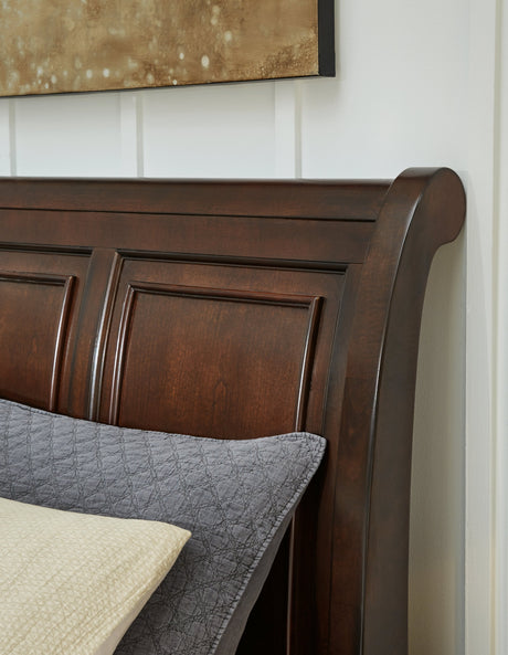 Porter Rustic Brown Sleigh Storage Platform Bedroom Set with 2 Footboard Drawers by Ashley at Eve Furniture
