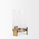 Price Small Antiqued Gold Metal w/ Glass Hurricane Candle Holder by Mercana at Eve Furniture