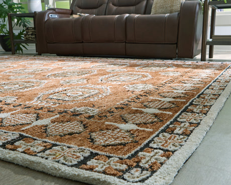 Qaabiz Sienna/Ivory/Black Large Rug by Ashley at Eve Furniture