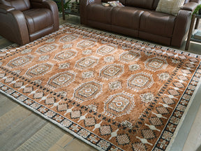 Qaabiz Sienna/Ivory/Black Large Rug by Ashley at Eve Furniture