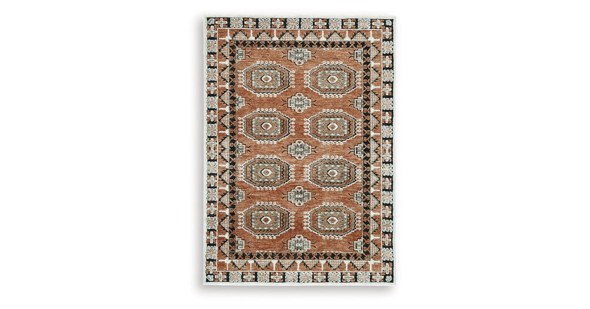 Qaabiz Sienna/Ivory/Black Medium Rug by Ashley at Eve Furniture