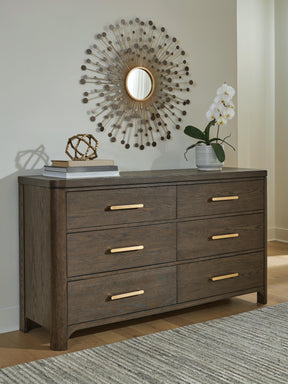 Radkin Burnished Brown Dresser by Ashley at Eve Furniture