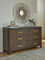 Radkin Burnished Brown Dresser by Ashley at Eve Furniture