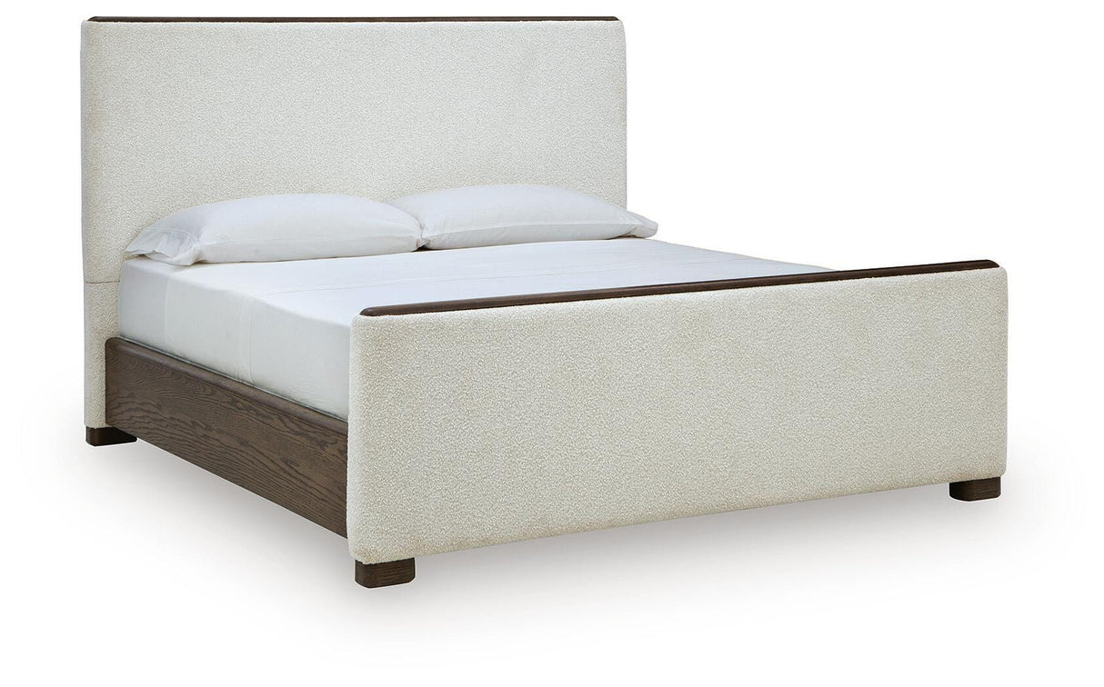 Radkin Burnished Brown Uphostered Panel Bedroom Set by Ashley at Eve Furniture