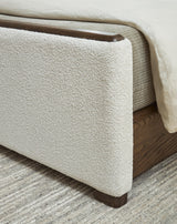 Radkin Burnished Brown Uphostered Panel Bedroom Set by Ashley at Eve Furniture