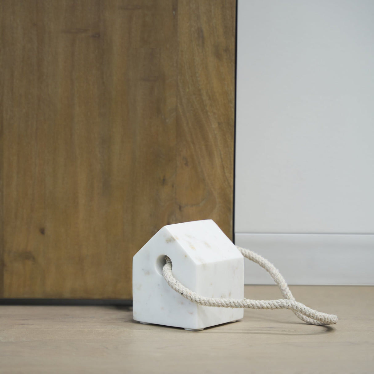 Raena White Marble House Door Stopper by Mercana at Eve Furniture
