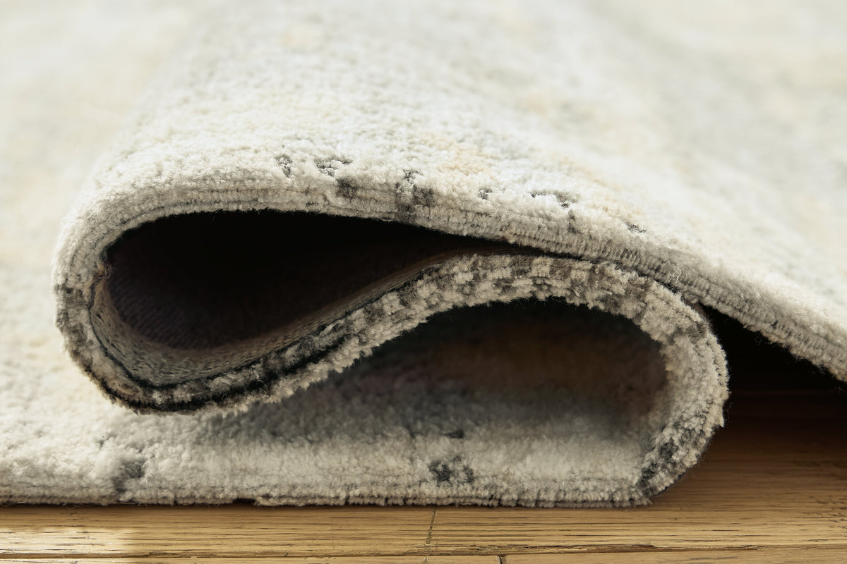Raif Gray/White/Cream Large Rug by Ashley at Eve Furniture